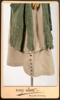 Campanella Duster Coat in New Day Washed Crinkled Linen; Harrison Frock in Picture Book Puckered Stripe Cotton; Blanchefleur Sash in New Day Floral Cotton Voile. By Ivey Abitz.