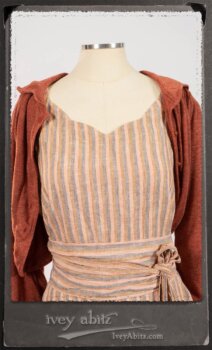 Crest Jacket in New Sun Softest Knit; Heraldry Frock in Rosy Washed Stripe Linen in High Water Length; Porte Cochere Sash in Rosy Washed Stripe Linen. By Ivey Abitz.