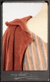 Crest Jacket in New Sun Softest Knit; Heraldry Frock in Rosy Washed Stripe Linen in High Water Length; Porte Cochere Sash in Rosy Washed Stripe Linen. By Ivey Abitz.