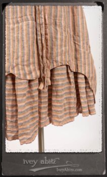 Crest Jacket in New Sun Softest Knit; Heraldry Frock in Rosy Washed Stripe Linen in High Water Length; Porte Cochere Sash in Rosy Washed Stripe Linen. By Ivey Abitz.