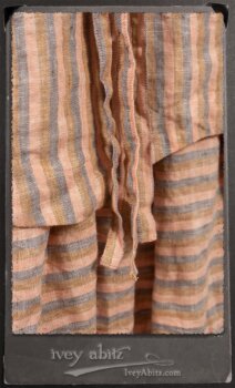 Crest Jacket in New Sun Softest Knit; Heraldry Frock in Rosy Washed Stripe Linen in High Water Length; Porte Cochere Sash in Rosy Washed Stripe Linen. By Ivey Abitz.