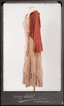 Crest Jacket in New Sun Softest Knit; Heraldry Frock in Rosy Washed Stripe Linen in High Water Length; Porte Cochere Sash in Rosy Washed Stripe Linen. By Ivey Abitz.