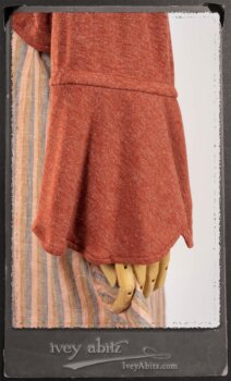 Crest Jacket in New Sun Softest Knit; Heraldry Frock in Rosy Washed Stripe Linen in High Water Length; Porte Cochere Sash in Rosy Washed Stripe Linen. By Ivey Abitz.