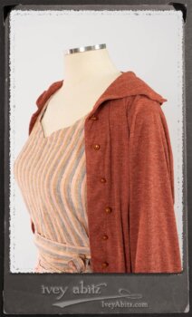 Crest Jacket in New Sun Softest Knit; Heraldry Frock in Rosy Washed Stripe Linen in High Water Length; Porte Cochere Sash in Rosy Washed Stripe Linen. By Ivey Abitz.