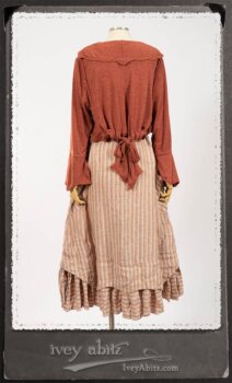 Crest Jacket in New Sun Softest Knit; Heraldry Frock in Rosy Washed Stripe Linen in High Water Length; Porte Cochere Sash in Rosy Washed Stripe Linen. By Ivey Abitz.