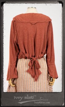 Crest Jacket in New Sun Softest Knit; Heraldry Frock in Rosy Washed Stripe Linen in High Water Length; Porte Cochere Sash in Rosy Washed Stripe Linen. By Ivey Abitz.