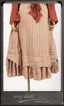Crest Jacket in New Sun Softest Knit; Heraldry Frock in Rosy Washed Stripe Linen in High Water Length; Porte Cochere Sash in Rosy Washed Stripe Linen. By Ivey Abitz.
