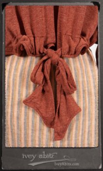 Crest Jacket in New Sun Softest Knit; Heraldry Frock in Rosy Washed Stripe Linen in High Water Length; Porte Cochere Sash in Rosy Washed Stripe Linen. By Ivey Abitz.