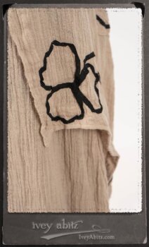 Monceau Duster Coat in Picture Book Washed Crinkled Linen; Monceau Frock in Picture Book Washed Crinkled Linen; Cilla Slip Frock in Signature Black Lightweight Linen Knit with Square Neckline. By Ivey Abitz.