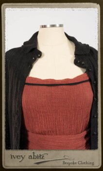 Truitt Shirt Jacket in Black Puckered Check Weave; Monceau Frock in Rosy Washed Crinkled Linen; Cilla Slip Frock in Signature Black Lightweight Linen Knit with Square Collar; Clotaire Sash in Rosy Washed Crinkled Linen. By Ivey Abitz.