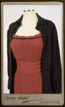 Truitt Shirt Jacket in Black Puckered Check Weave; Monceau Frock in Rosy Washed Crinkled Linen; Cilla Slip Frock in Signature Black Lightweight Linen Knit with Square Collar; Clotaire Sash in Rosy Washed Crinkled Linen. By Ivey Abitz.