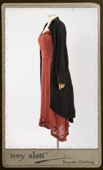 Truitt Shirt Jacket in Black Puckered Check Weave; Monceau Frock in Rosy Washed Crinkled Linen; Cilla Slip Frock in Signature Black Lightweight Linen Knit with Square Collar; Clotaire Sash in Rosy Washed Crinkled Linen. By Ivey Abitz.