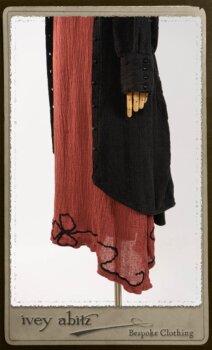 Truitt Shirt Jacket in Black Puckered Check Weave; Monceau Frock in Rosy Washed Crinkled Linen; Cilla Slip Frock in Signature Black Lightweight Linen Knit with Square Collar; Clotaire Sash in Rosy Washed Crinkled Linen. By Ivey Abitz.