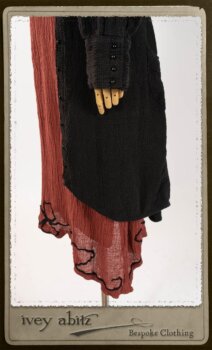 Truitt Shirt Jacket in Black Puckered Check Weave; Monceau Frock in Rosy Washed Crinkled Linen; Cilla Slip Frock in Signature Black Lightweight Linen Knit with Square Collar; Clotaire Sash in Rosy Washed Crinkled Linen. By Ivey Abitz.