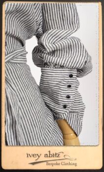 Scattergood Shirt Jacket in Black and White Petite Stripe Linen; Scattergood Frock in Rosy Washed Cotton; Addy Skirt in Black and White Petite Stripe Linen. By Ivey Abitz.