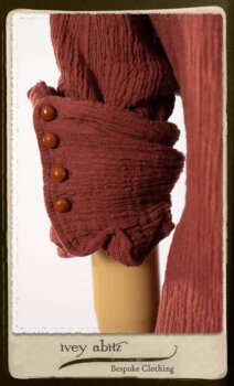 Scattergood Duster Coat in Rosy Washed Crinkled Linen; Porte Cochere Sash in Rosy Washed Floral Linen; Scattergood Frock in Rosy Washed Cotton. By Ivey Abitz.