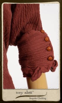 Scattergood Duster Coat in Rosy Washed Crinkled Linen; Porte Cochere Sash in Rosy Washed Floral Linen; Scattergood Frock in Rosy Washed Cotton. By Ivey Abitz.