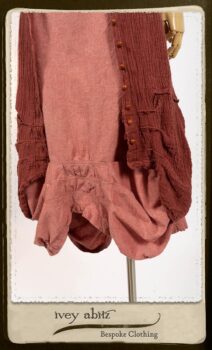 Scattergood Duster Coat in Rosy Washed Crinkled Linen; Porte Cochere Sash in Rosy Washed Floral Linen; Scattergood Frock in Rosy Washed Cotton. By Ivey Abitz.