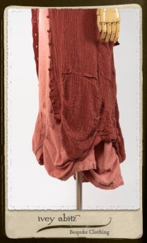 Scattergood Duster Coat in Rosy Washed Crinkled Linen; Porte Cochere Sash in Rosy Washed Floral Linen; Scattergood Frock in Rosy Washed Cotton. By Ivey Abitz.