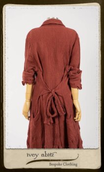 Scattergood Duster Coat in Rosy Washed Crinkled Linen; Porte Cochere Sash in Rosy Washed Floral Linen; Scattergood Frock in Rosy Washed Cotton. By Ivey Abitz.