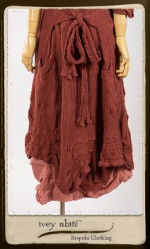 Scattergood Duster Coat in Rosy Washed Crinkled Linen; Porte Cochere Sash in Rosy Washed Floral Linen; Scattergood Frock in Rosy Washed Cotton. By Ivey Abitz.