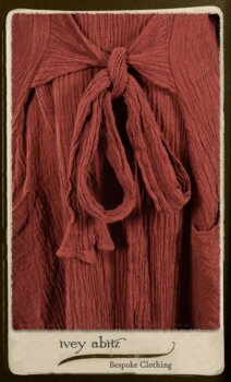 Scattergood Duster Coat in Rosy Washed Crinkled Linen; Porte Cochere Sash in Rosy Washed Floral Linen; Scattergood Frock in Rosy Washed Cotton. By Ivey Abitz.