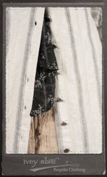 Harrison Duster Coat in Black and White Picture Book Stripe; Harrison Shirt Jacket in Picture Book Washed Crinkled Linen; Clotaire Sash in White on Black Floral Silk Chiffon; Fairholme Frock in Black and White Picture Book Stripe. By Ivey Abitz.