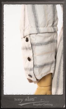 Harrison Duster Coat in Black and White Picture Book Stripe; Harrison Shirt Jacket in Picture Book Washed Crinkled Linen; Clotaire Sash in White on Black Floral Silk Chiffon; Fairholme Frock in Black and White Picture Book Stripe. By Ivey Abitz.