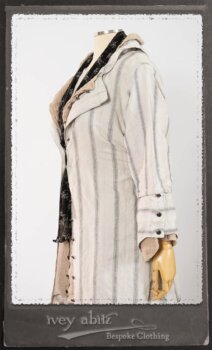 Harrison Duster Coat in Black and White Picture Book Stripe; Harrison Shirt Jacket in Picture Book Washed Crinkled Linen; Clotaire Sash in White on Black Floral Silk Chiffon; Fairholme Frock in Black and White Picture Book Stripe. By Ivey Abitz.
