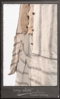 Harrison Duster Coat in Black and White Picture Book Stripe; Harrison Shirt Jacket in Picture Book Washed Crinkled Linen; Clotaire Sash in White on Black Floral Silk Chiffon; Fairholme Frock in Black and White Picture Book Stripe. By Ivey Abitz.