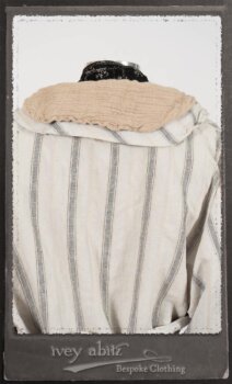 Harrison Duster Coat in Black and White Picture Book Stripe; Harrison Shirt Jacket in Picture Book Washed Crinkled Linen; Clotaire Sash in White on Black Floral Silk Chiffon; Fairholme Frock in Black and White Picture Book Stripe. By Ivey Abitz.