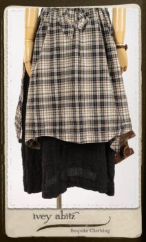 Bramley Frock in Black and White Picture Book Plaid; Bertie Frock in Black Puckered Check Weave. By Ivey Abitz.