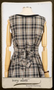 Bramley Frock in Black and White Picture Book Plaid; Bertie Frock in Black Puckered Check Weave. By Ivey Abitz.
