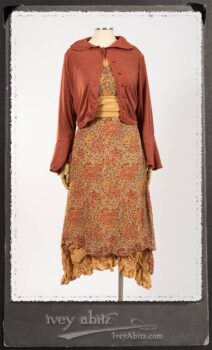 Crest Jacket in New Sun Softest Knit; Blanchefleur Sash in New Sun Washed Linen; Crest Frock in New Sun Floral Silk Chiffon in High Water Length; Edenshire Frock in New Sun Washed Linen in High Water Length. By Ivey Abitz.