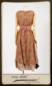 Crest Frock in New Sun Floral Silk Chiffon in High Water Length; Porte Cochere Sash in Rosy Washed Cotton; Heraldry Frock in Rosy Washed Stripe Linen in High Water Length. By Ivey Abitz.