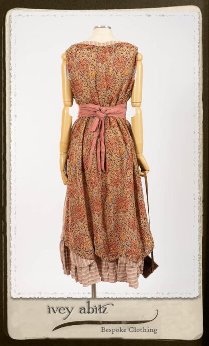 Crest Frock in New Sun Floral Silk Chiffon in High Water Length; Porte Cochere Sash in Rosy Washed Cotton; Heraldry Frock in Rosy Washed Stripe Linen in High Water Length. By Ivey Abitz.