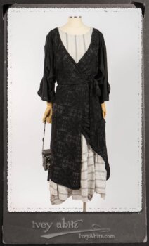 Chomley Frock in Black Embroidered Voile Pinned Back to Side Pocket; Addy Jacket in Signature Black Lightweight Linen Knit; Fairholme Frock in Black and White Picture Book Stripe in High Water Length. By Ivey Abitz.