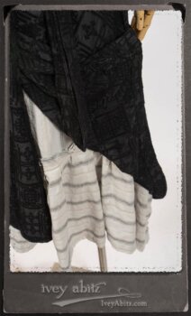 Chomley Frock in Black Embroidered Voile Pinned Back to Side Pocket; Addy Jacket in Signature Black Lightweight Linen Knit; Fairholme Frock in Black and White Picture Book Stripe in High Water Length. By Ivey Abitz.