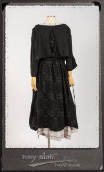 Chomley Frock in Black Embroidered Voile Pinned Back to Side Pocket; Addy Jacket in Signature Black Lightweight Linen Knit; Fairholme Frock in Black and White Picture Book Stripe in High Water Length. By Ivey Abitz.