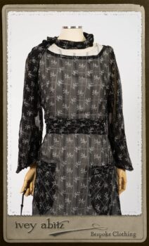Bramley Dress in White on Black Floral Silk Chiffon; Fairholme Frock in Black and White Picture Book Stripe; Clotaire Sash in White on Black Floral Silk Chiffon. By Ivey Abitz.