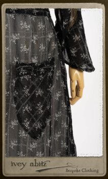 Bramley Dress in White on Black Floral Silk Chiffon; Fairholme Frock in Black and White Picture Book Stripe; Clotaire Sash in White on Black Floral Silk Chiffon. By Ivey Abitz.