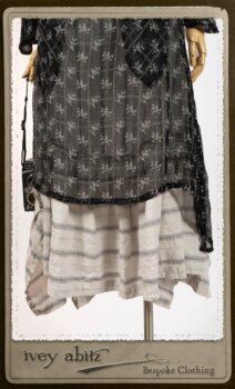 Bramley Dress in White on Black Floral Silk Chiffon; Fairholme Frock in Black and White Picture Book Stripe; Clotaire Sash in White on Black Floral Silk Chiffon. By Ivey Abitz.