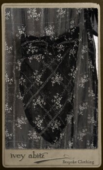 Bramley Dress in White on Black Floral Silk Chiffon; Fairholme Frock in Black and White Picture Book Stripe; Clotaire Sash in White on Black Floral Silk Chiffon. By Ivey Abitz.