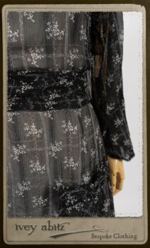 Bramley Dress in White on Black Floral Silk Chiffon; Fairholme Frock in Black and White Picture Book Stripe; Clotaire Sash in White on Black Floral Silk Chiffon. By Ivey Abitz.