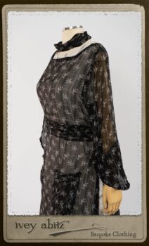 Bramley Dress in White on Black Floral Silk Chiffon; Fairholme Frock in Black and White Picture Book Stripe; Clotaire Sash in White on Black Floral Silk Chiffon. By Ivey Abitz.