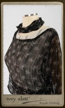 Bramley Dress in White on Black Floral Silk Chiffon; Fairholme Frock in Black and White Picture Book Stripe; Clotaire Sash in White on Black Floral Silk Chiffon. By Ivey Abitz.