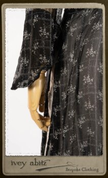 Bramley Dress in White on Black Floral Silk Chiffon; Fairholme Frock in Black and White Picture Book Stripe; Clotaire Sash in White on Black Floral Silk Chiffon. By Ivey Abitz.