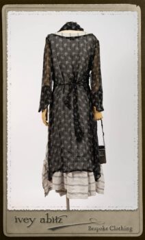 Bramley Dress in White on Black Floral Silk Chiffon; Fairholme Frock in Black and White Picture Book Stripe; Clotaire Sash in White on Black Floral Silk Chiffon. By Ivey Abitz.