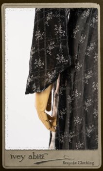 Bramley Dress in White on Black Floral Silk Chiffon; Fairholme Frock in Black and White Picture Book Stripe; Clotaire Sash in White on Black Floral Silk Chiffon. By Ivey Abitz.