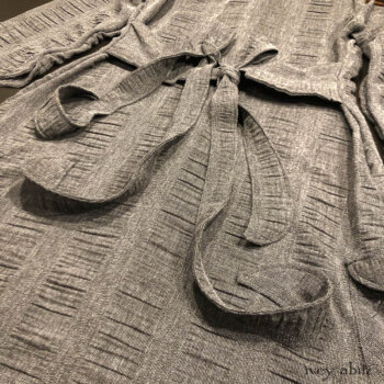 Morningside Duster Coat in Tintype Puckered Stripe Weave. Back view of our signature tabs and tie detail.